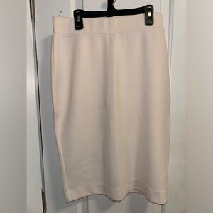 NWOT. Brand New cream skirt size M.